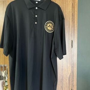 Peter Millar Black Polo with Harry Potter Ministry of Magic emblem.